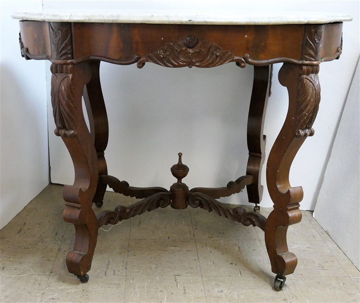 Nice Rosewood Marble Turtle Top Victorian Table - Rose Carved - Measures 30 1/2" Tall 39" by 27" - 1 Castor Needs to Be Re- Doweled - Repair on One Corner - See Photo 