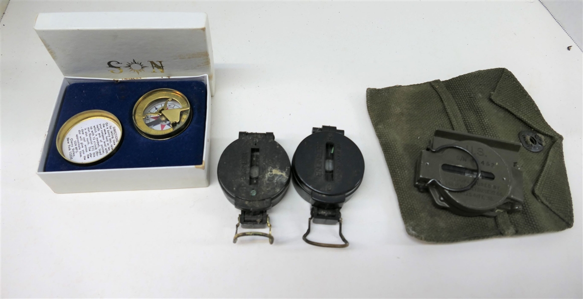 4 Compasses- One US Military Compass-Vietnam; 2 Engineering Compasses; One Son Manufacturing Co. Compass With Sun Dial
