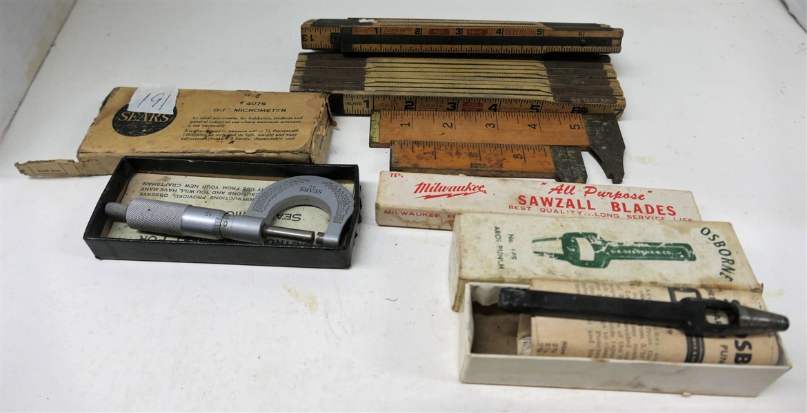 2 Wood Folding Rulers, 2 Small Rulers, Sears 0-1" Micrometer, Milwaukee  All Purpose Sawzall Blades 5 count, Osborne Arch Punch
