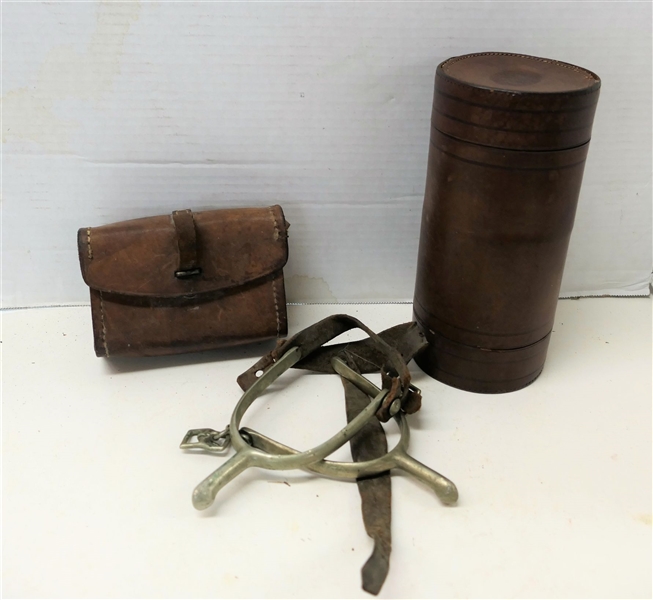 Leather Cartridge Pouch, Pair of Spurs, and Leather London Make Warranted Cylinder - Numbers 8200 - Cylinder Measures 8 1/2" tall 