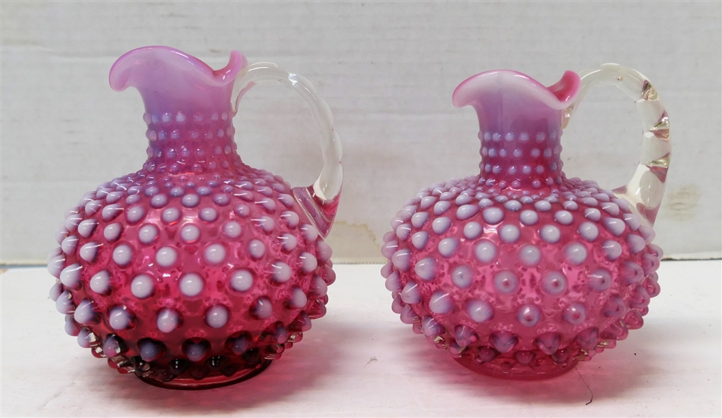 Pair of Cranberry Opalescent Pitchers with Clear Applied Handles - Measuring 5" tall 