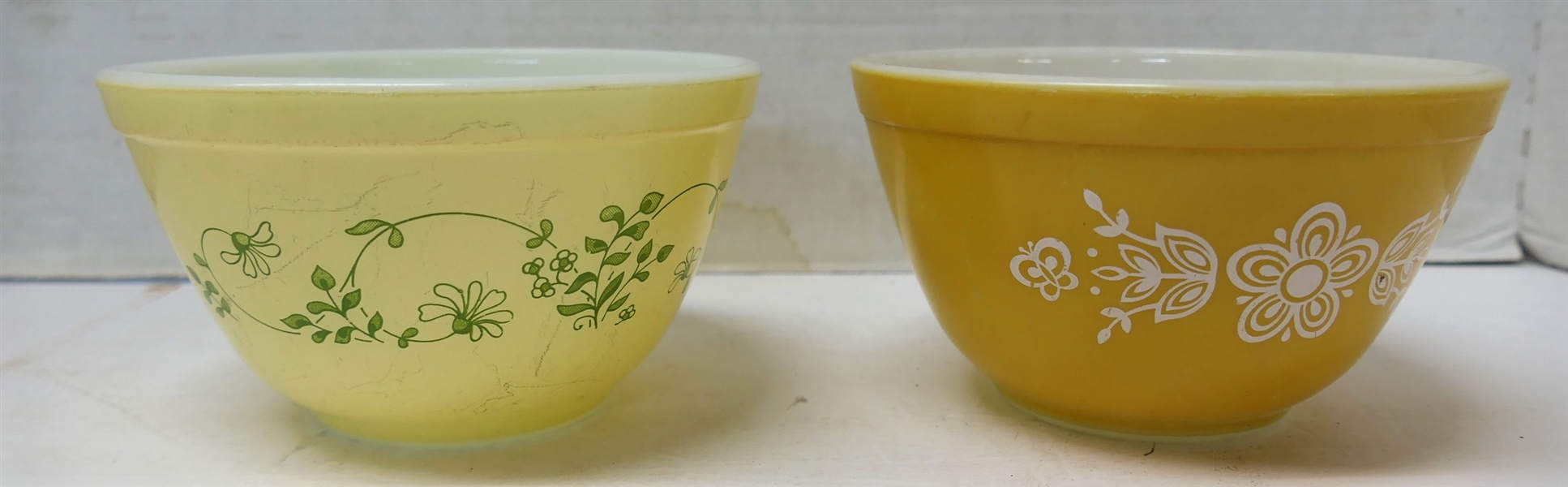 2 Small 1 1/2 Pint Pyrex Mixing Bowls - Yellow with White Flowers and Light Yellow with Green Flowers