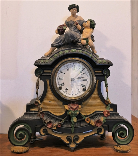 Cast Iron Clock with Figures on Top with Key and Pendulum - Measures 19" tall 15" by 4"