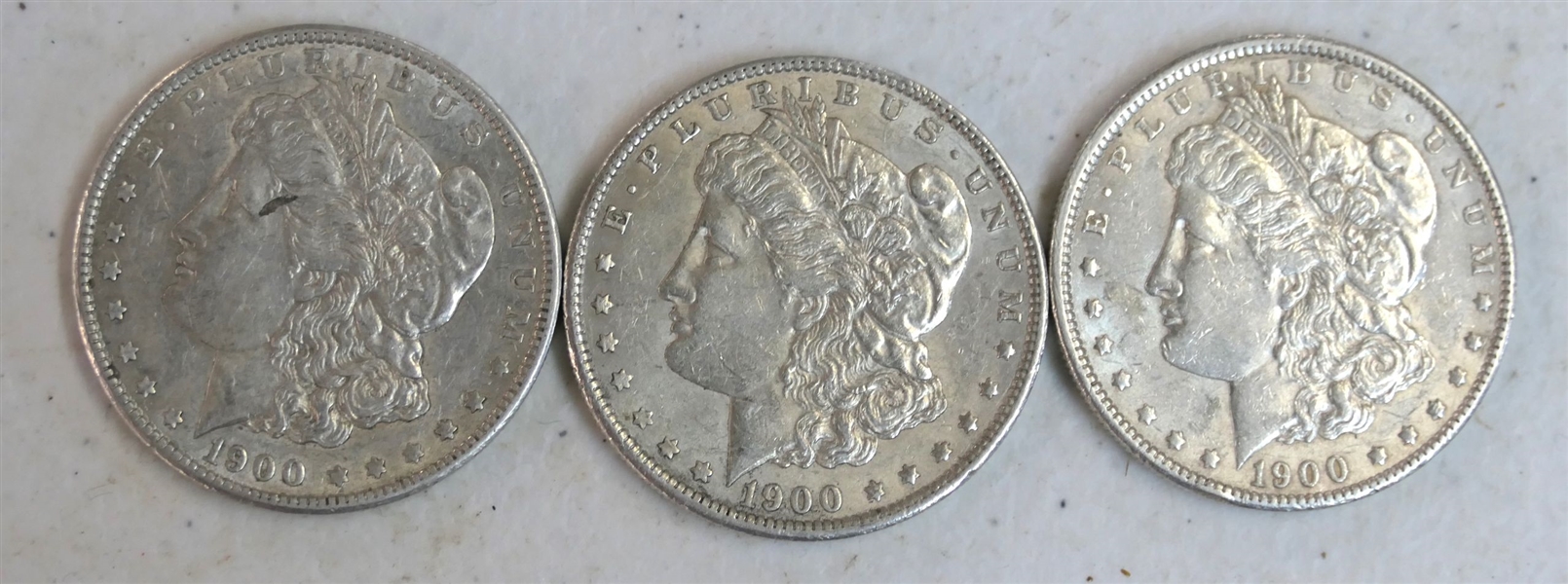 3 -1900 Morgan Silver Dollars 