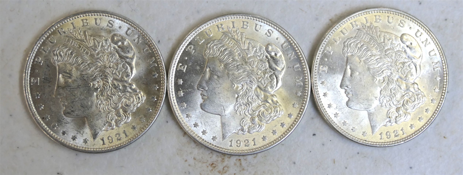 3 - 1921 Morgan Silver Dollars 