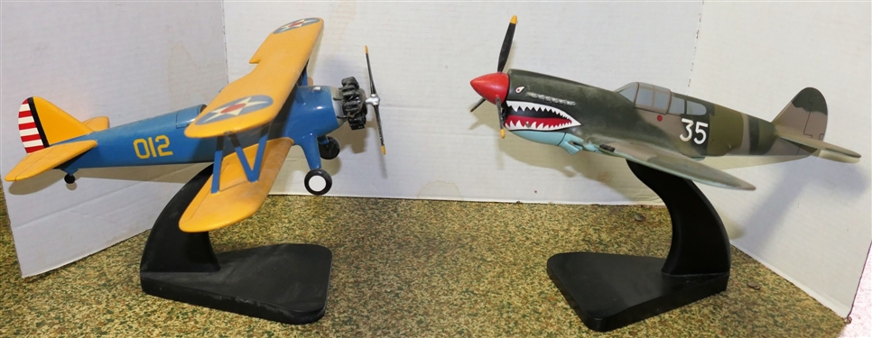 2 Military Airplane Models - Blue and Yellow 012 and Camo 35 - Both on Black Stands- Each Measures Approx. 9 Tall 