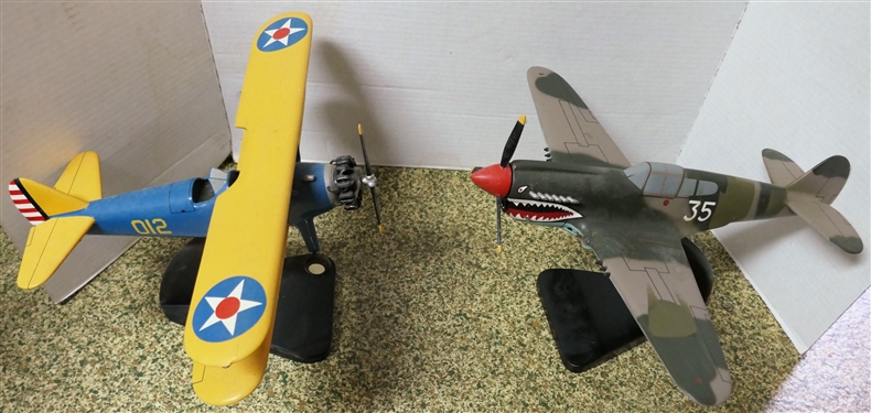 2 Military Airplane Models - Blue and Yellow 012 and Camo 35 - Both on Black Stands- Each Measures Approx. 9 Tall 