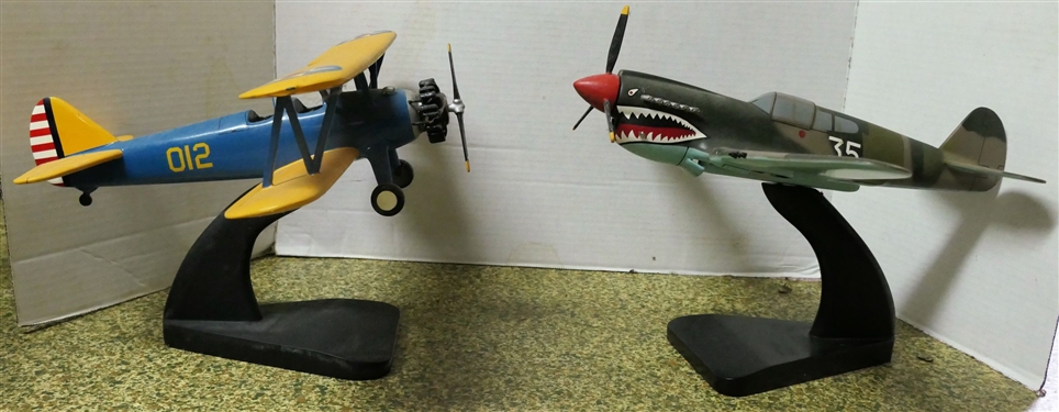 2 Military Airplane Models - Blue and Yellow 012 and Camo 35 - Both on Black Stands- Each Measures Approx. 9 Tall 