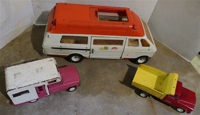 Lot of 3 Tonka Toys - Pink Camper, Red and Yellow Dump Truck, and Ambulance - with Tonka Patient and Stretcher - Ambulance Has Crack on Back Light -