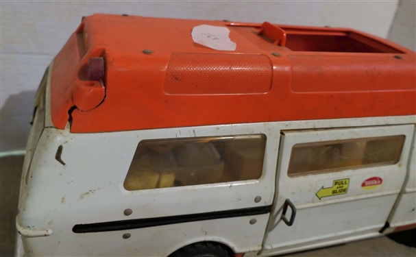 Lot of 3 Tonka Toys - Pink Camper, Red and Yellow Dump Truck, and Ambulance - with Tonka Patient and Stretcher - Ambulance Has Crack on Back Light -