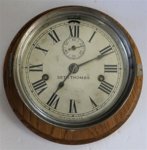 Seth Thomas Ships Clock with Second Register - Nickel Exterior - Works - Mounted on Oak Plaque - Measures 7" Across
