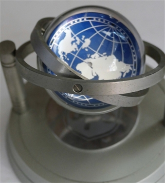 UPS Orbital Clock - Japanese Movement - Magnified Face and Globe - Measures 4 Tall 4 Across