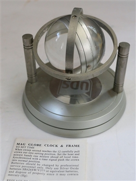 UPS Orbital Clock - Japanese Movement - Magnified Face and Globe - Measures 4 Tall 4 Across