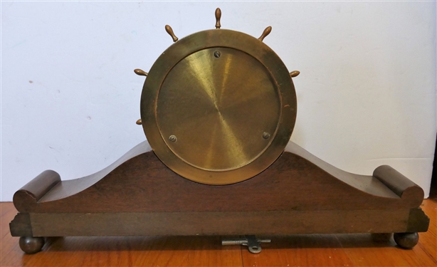 Brass Ship Wheel Ship Clock (Waterbury?) in Mahogany Stand - Clock Measures 8 Across - Holder Measures 18 by 3 1/2 