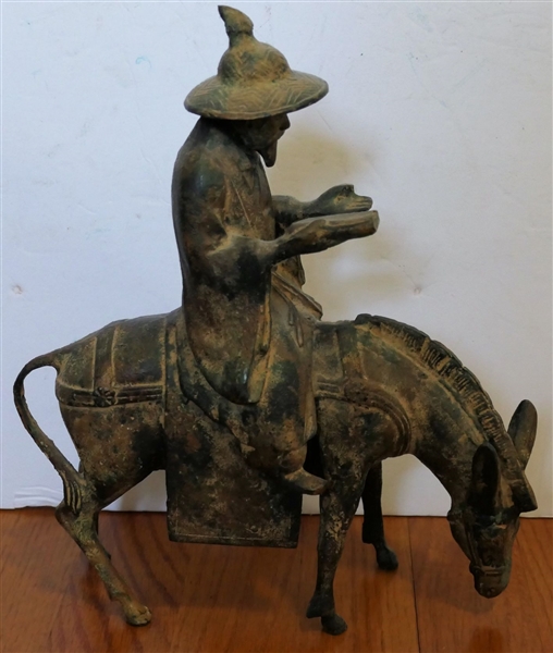 Heavy Metal Asian Figure Riding a Horse - Measuring 11" Tall 10" Long 