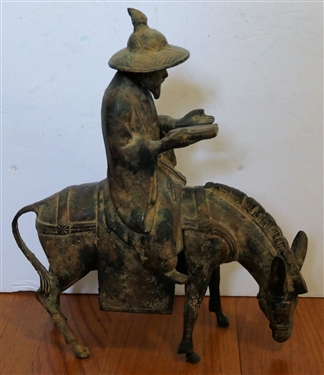 Heavy Metal Asian Figure Riding a Horse - Measuring 11 Tall 10 Long 