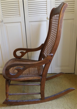 Rocking Chair with Cane Back and Seat - Turned Stretcher - Some Damage to Caning At Top of Back 