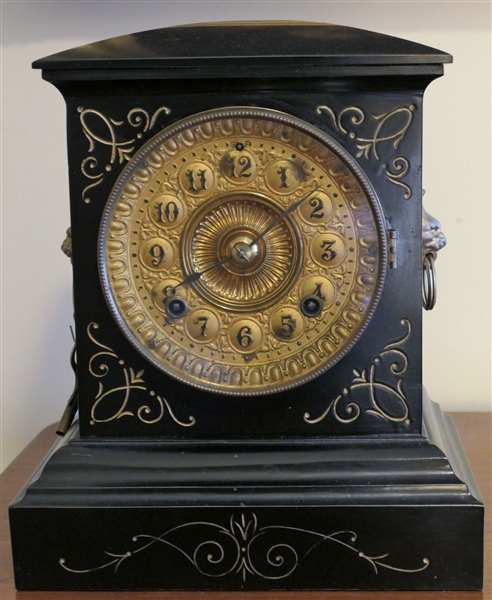 Ansonia Iron and Brass Mantle Clock with Jey and Pendulum - Lions Heads on Each End - Measures 10 1/2" tall 9 1/2" by 6 1/2" 