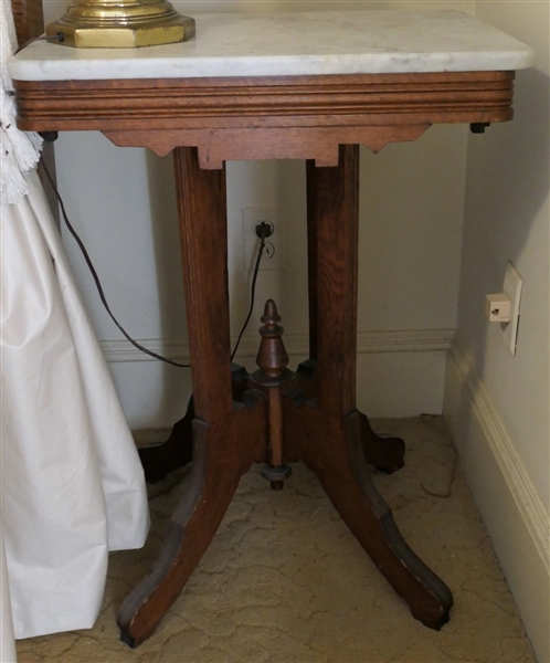 Walnut Victorian Marble Top Table - Measures 29" tall 22" by 16" 