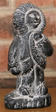  A Wolf Original Hand Made in Canada - Musher Statuette and Other Figure - Musher Measures 4 1/2 tall 14 by 3 1/2 