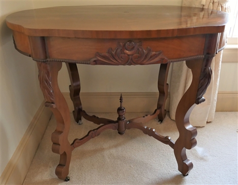 Flame Mahogany Victorian Turtle Top Parlor Table with Scrolled Legs - Rose Carved Apron Arched Stretcher Base - Measures 29 Tall 38 by 26 1/2