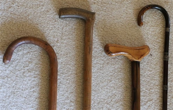 4 Wood Walking Canes  - 1 Grain Painted with Silver Tone Bands - Measuring 35 1/2 Long