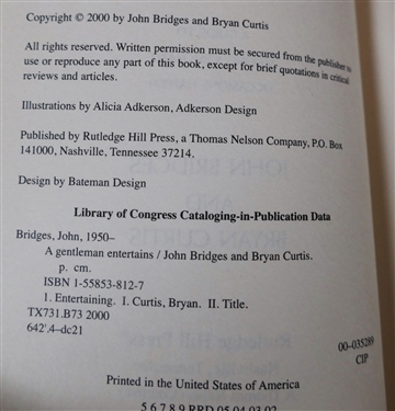 A Gentleman Entertains by John Bridges and Bryan Curtis - Leather Bound Hardcover Book With Gold Lettering and Pages - Published in 2000 For Brooks Brothers 