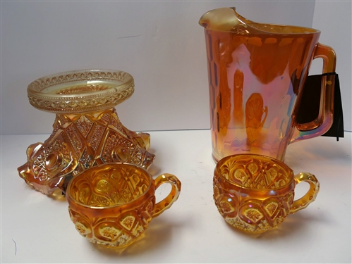 4 Pieces of Marigold Carnival Glass including 8 Pitcher, Punch Bowl Base, and 2 Punch Cups