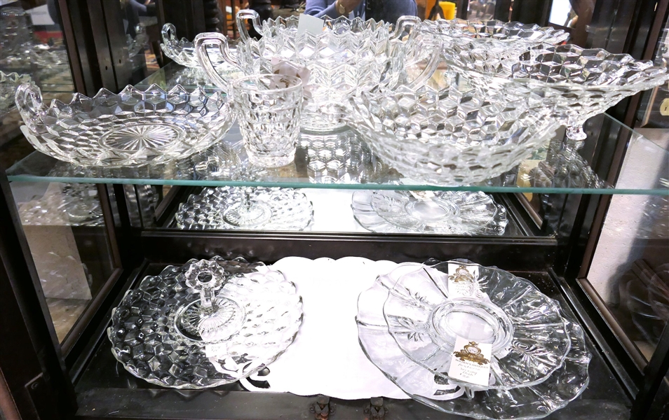 2 Shelves of Clear Glassware including American Fostoria Bowls, Platters, and Handled Bowls 