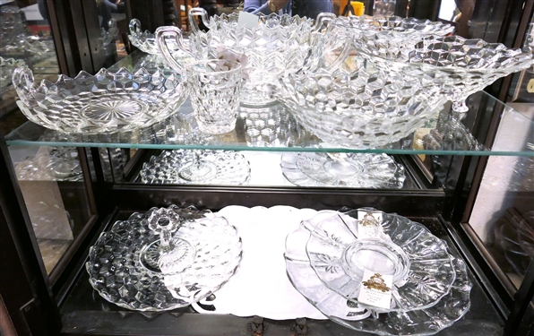2 Shelves of Clear Glassware including American Fostoria Bowls, Platters, and Handled Bowls 