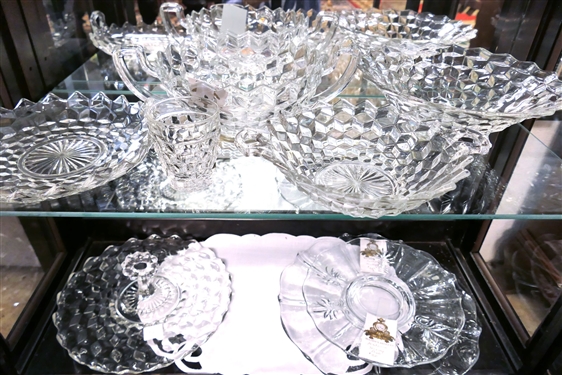 2 Shelves of Clear Glassware including American Fostoria Bowls, Platters, and Handled Bowls 