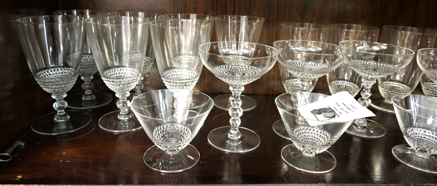 Large Lot of Clear Glassware including Goblets with Etched Stars, Elegant Glass with Flowers, and Others 