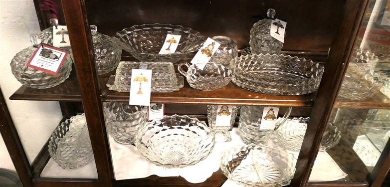 2 Shelves of Glassware including Mostly Early American Fostoria - Footed Bowls, Butter Dishes, Covered Candy Dishes, Pitcher,  Footed Vase, and Oval Divided Bowls