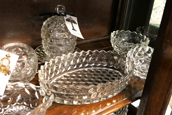 2 Shelves of Glassware including Mostly Early American Fostoria - Footed Bowls, Butter Dishes, Covered Candy Dishes, Pitcher,  Footed Vase, and Oval Divided Bowls