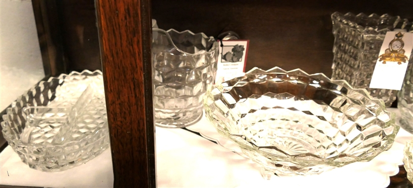 2 Shelves of Glassware including Mostly Early American Fostoria - Footed Bowls, Butter Dishes, Covered Candy Dishes, Pitcher,  Footed Vase, and Oval Divided Bowls