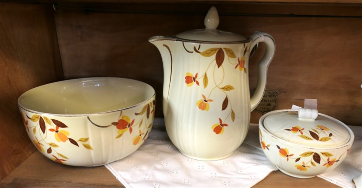 6 Pieces of Hall's Jewel Tea including Tea Pot with Insert, Salt & Pepper Shakers, Lidded Bowl, Coffee Pot, and Other Bowl - Both Bowls and Coffee Pot Have Damage 