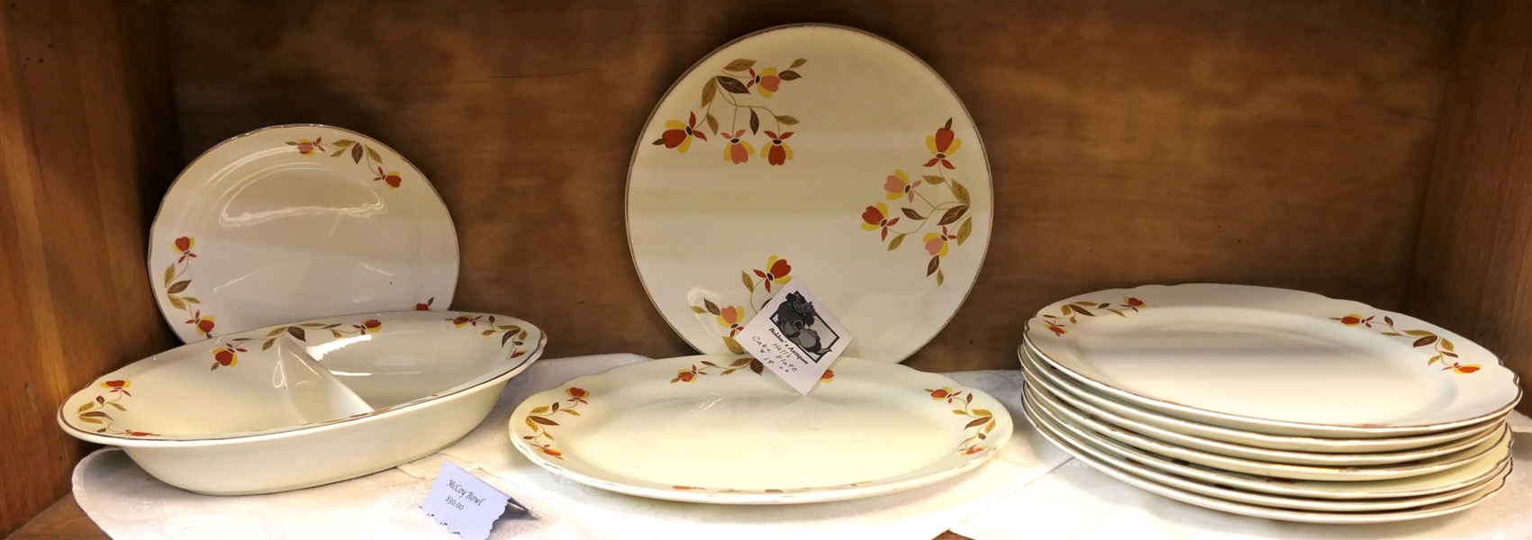 11 Pieces of Halls Jewel Tea including - Oval Divided Bowl, Cake Plate, and 7 Dinner Plates 