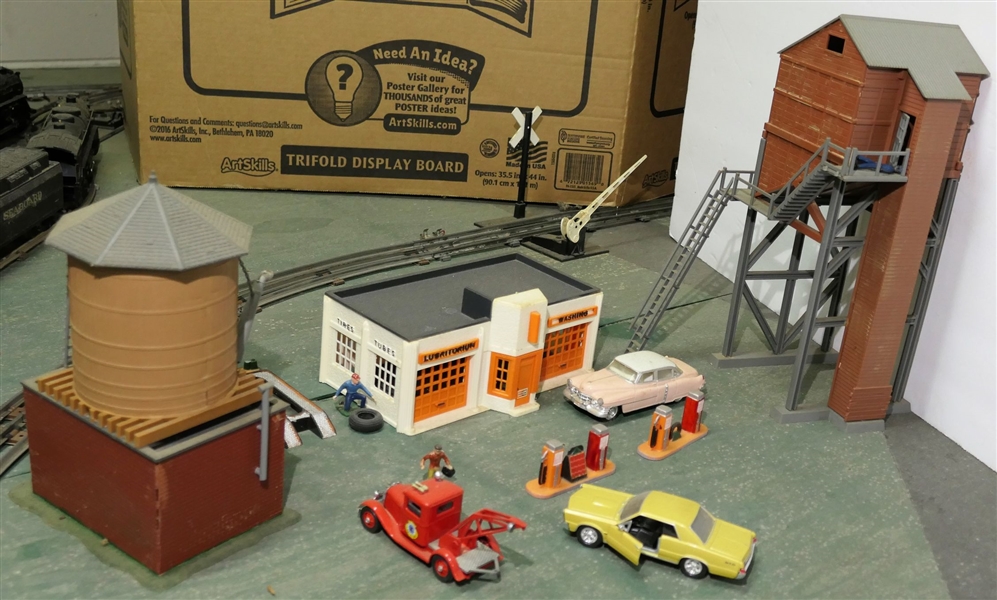 Plastic Service Station, Gas Pumps, Water Tower, Tall Tower, and Cars including Tow Truck - Also including Spare Tire, Vehicle Lift, and Mechanic Figure