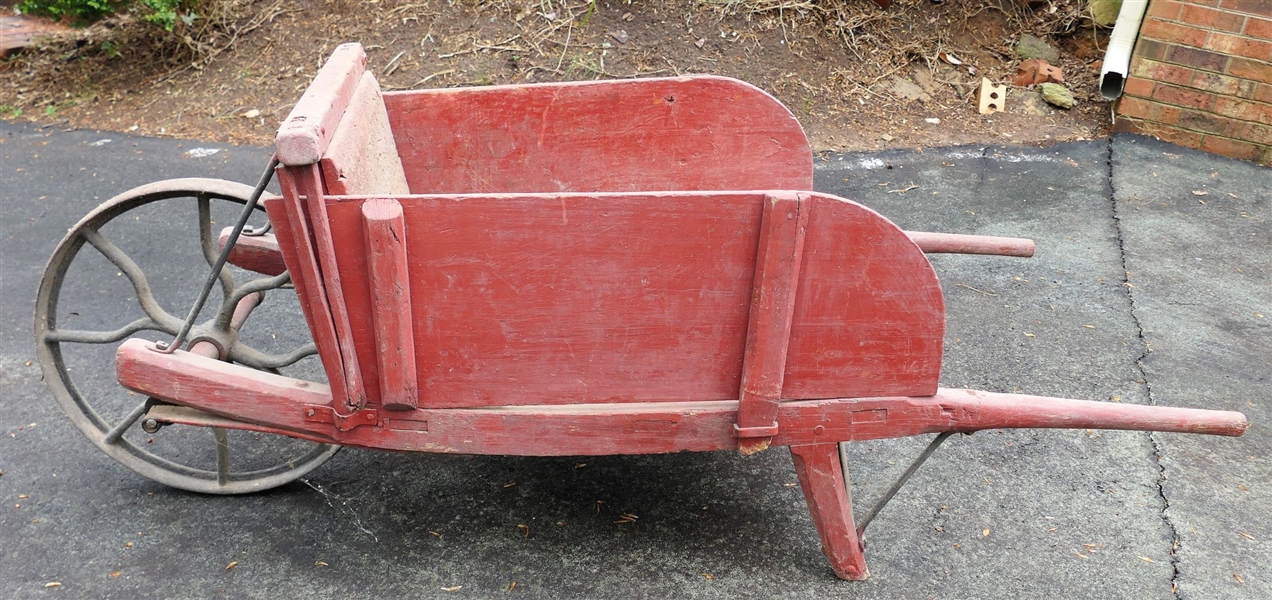 Antique Wood Wheelbarrow with Large Iron Wheel - Original Red Paint - Wheel Measures 20" Across - Overall Measures 26" tall 28" Across