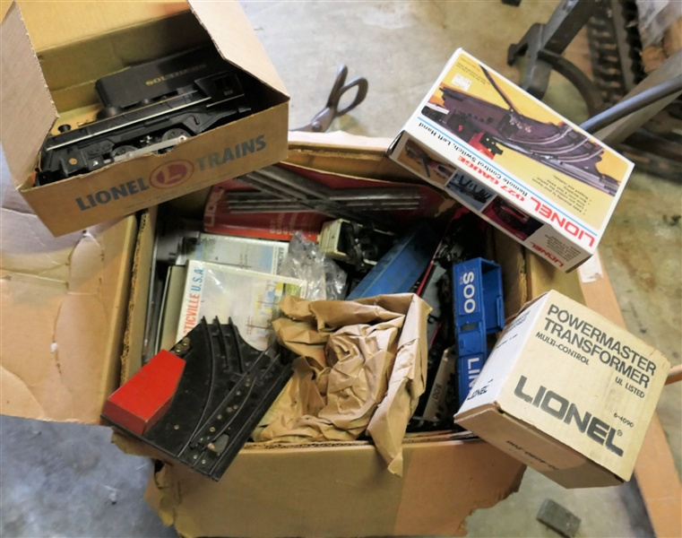 Large Box of Lionel Trains including Track, Control Switch, Transformer, Southern 666 Engine and Coal Car, Train Cars, and Plasticville USA Pieces
