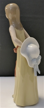 Lladro Girl Figure with Hat Behind Back -  Number 5006 - Measures 9 1/2 Tall 