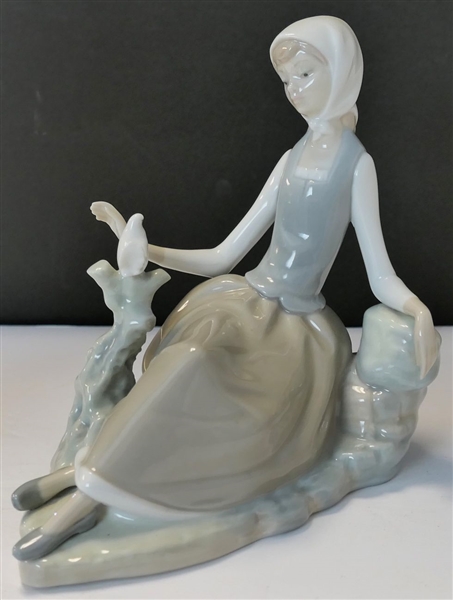 Lladro Figure of Reclining Woman with Bird - Measures 6 1/2" Tall 7" Long