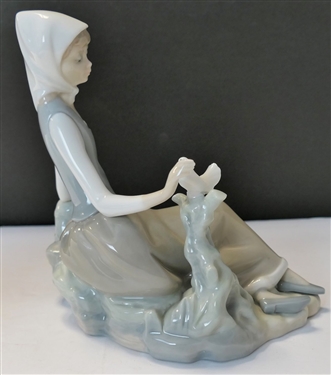Lladro Figure of Reclining Woman with Bird - Measures 6 1/2 Tall 7 Long