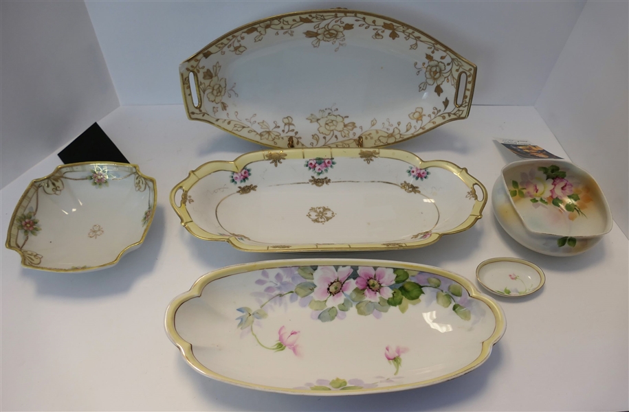 6 Pieces of Hand Painted Nippon - 3 Oval Plates, 2 Small Bowls, and Tiny Oval Bowl - Largest Oval Dish with Handles Measures 13" Long and Has Small Chip - Smallest measures 2 3/4" Long
