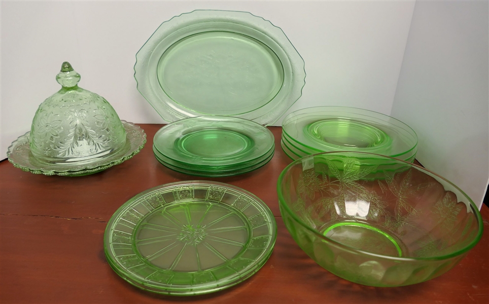 12 Pieces of Green Depression Glass including Butter Dish, 8 1/4" Plates, 7 1/2" Bowl, and Oval Platter