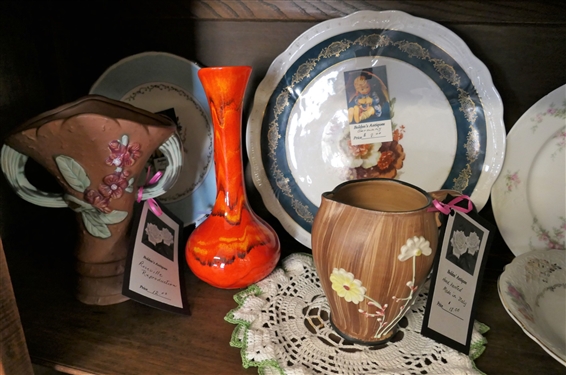 Lot of Glassware and China including Bells, Limoges Plate, Reproduction Roseville, Fruit Bowl and Pitcher, Floral Bowls and Plates