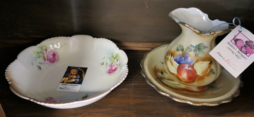 Lot of Glassware and China including Bells, Limoges Plate, Reproduction Roseville, Fruit Bowl and Pitcher, Floral Bowls and Plates