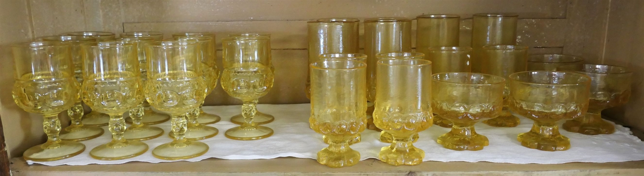 27 Pieces of Yellow Glassware including 11 Kings Crown Measuring 6" tall 