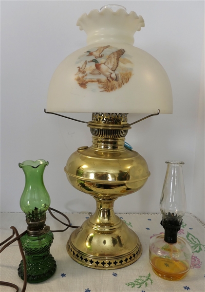 3 Lamps including Brass Electric Lamp with Glass Flying Duck Shade, Green Diamond Point 8", and Clear