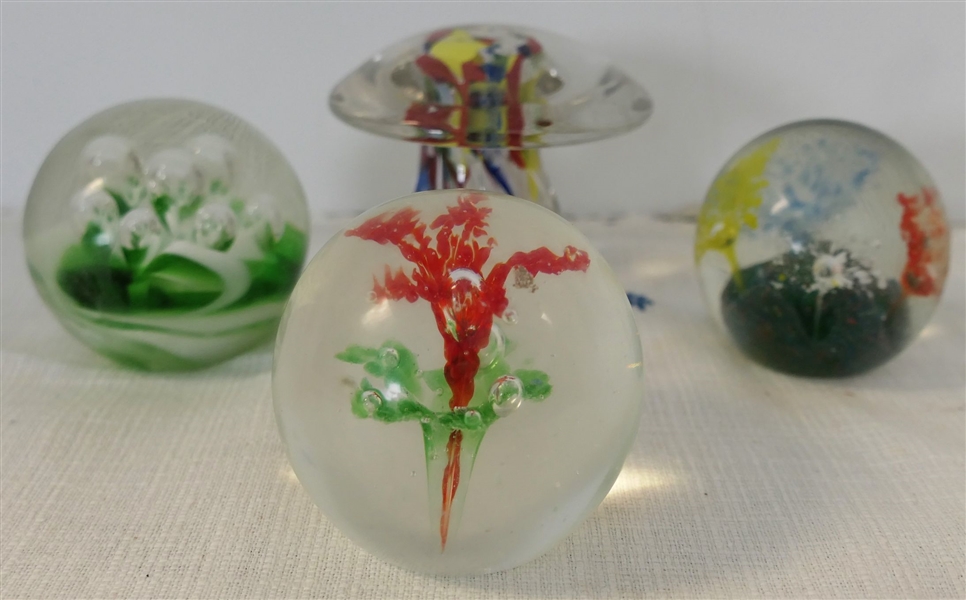 4 Art Glass Paperweights -Flowers, Green and White Swirl, and  Mushroom  - Mushroom  Measures 2 3/4" Tall 